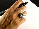A platinum diamond, pearl and ruby cocktail ring. 1960 circa