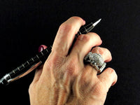 An Art Déco platinum and diamond ring. 1930 c.a