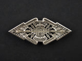 An Art Déco platinum ad diamond brooch. France, 1930.