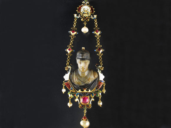 A XIX Century neo renaissance gold jeweled and enameled pendant holding an agate bust of a Greek warrior.