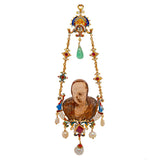 A XIX Century neo renaissance gold jeweled, emerald, ruby, natural pearls and enameled pendant holding an agate bust of a man.