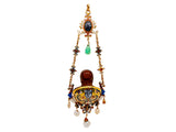 A XIX Century neo renaissance gold jeweled, emerald, ruby, natural pearls and enameled pendant holding an agate bust of a man.