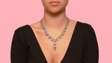 A late XIX Century silver topped, Yellow gold and old-cut diamonds garland necklace.