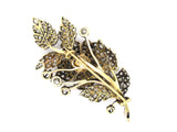 A XIX Century yellow gold and silver trembleuse brooch with old-cut and rose-cut diamonds. France, 1860.