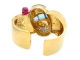 Retro gold, diamond, aquamarine, ruby and diamond cuff bracelet, 1940 c.a.