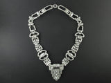 An Art Déco platinum and diamond necklace, transformable in two bracelets and one brooch. In original fitted box