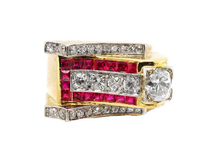 Anello in oro giallo, diamanti e rubini.