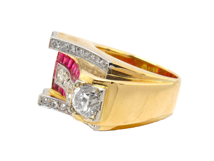 Anello in oro giallo, diamanti e rubini.