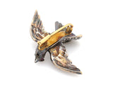 A XIX Century yellow gold, silver, rose cut diamond and rubies bird brooch