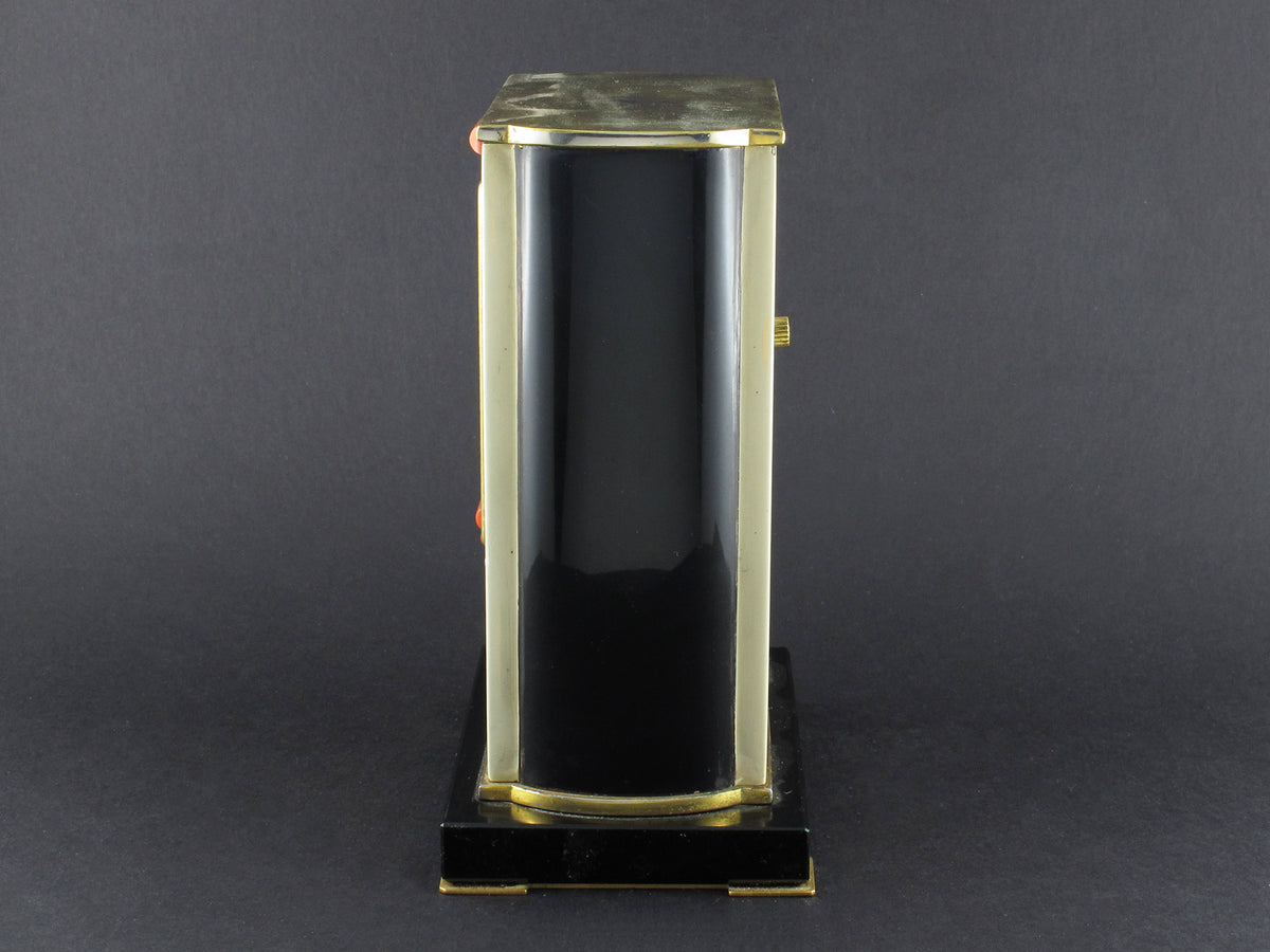 A rare yellow gold, black enamel, glass and coral electric Cartier desk timepiece 1931 In original Cartier fitted box 