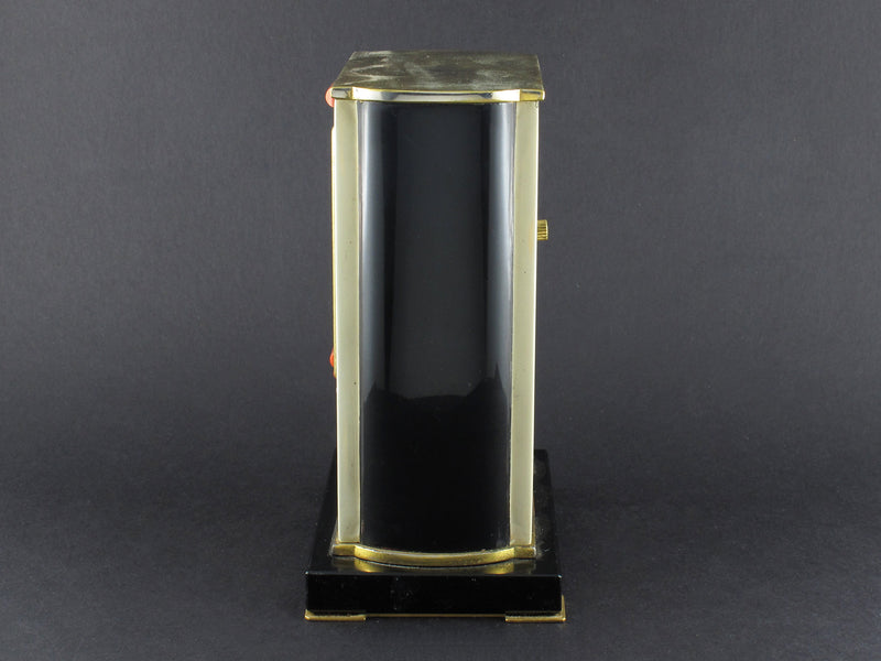 A rare yellow gold, black enamel, glass and coral electric Cartier desk timepiece 1931 In original Cartier fitted box 