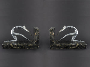 Art Déco silver and marble woman diving bookends.