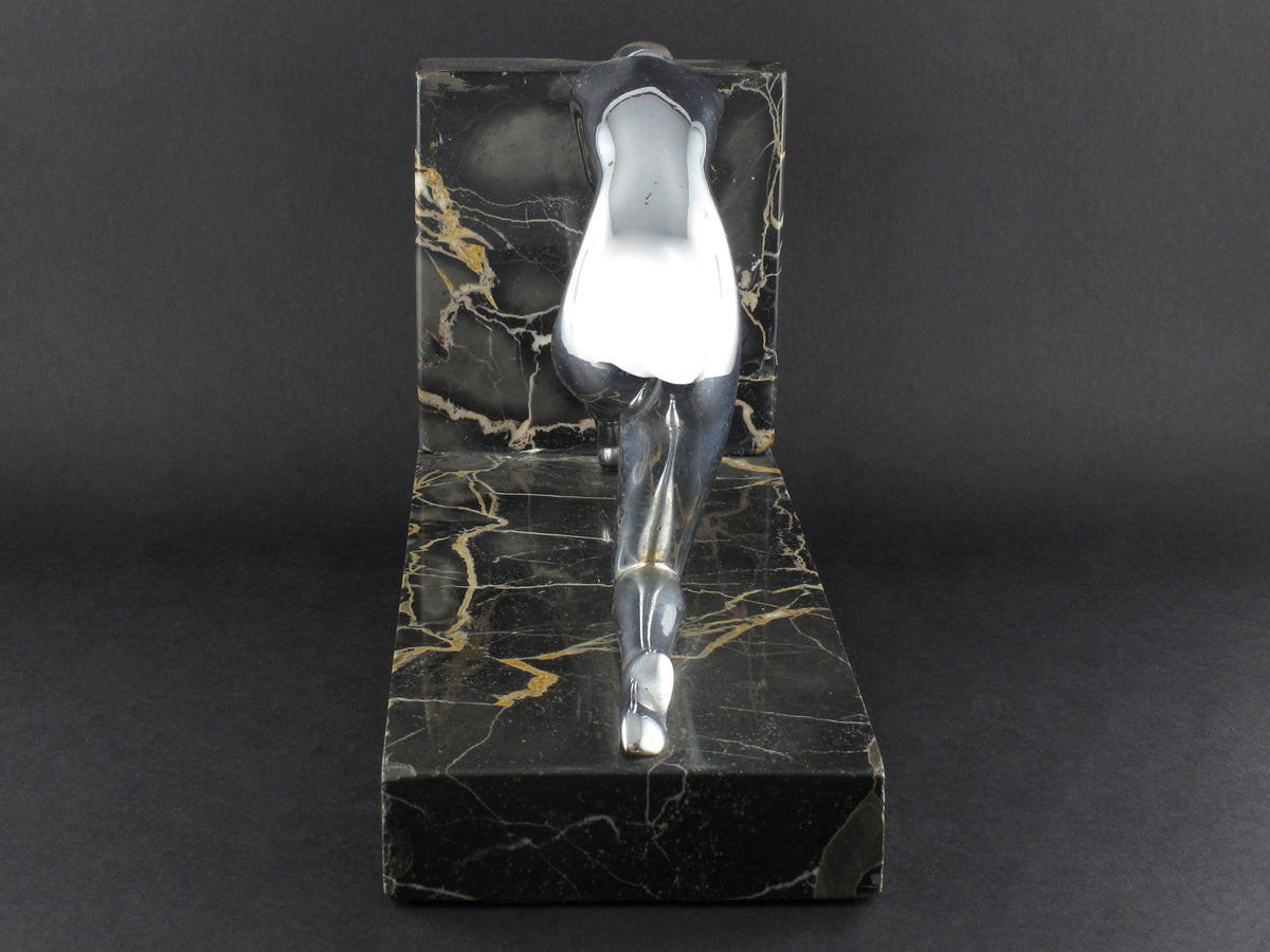Art Déco silver and marble woman diving bookends.