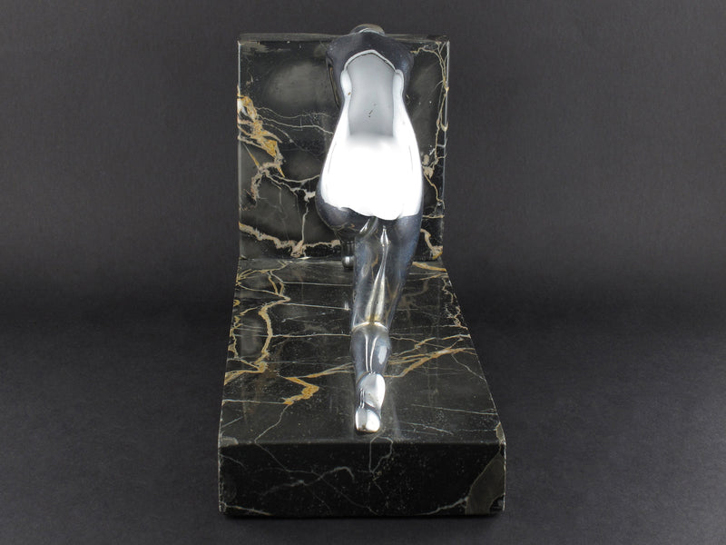 Art Déco silver and marble woman diving bookends.