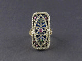 A Georgian gold, silver, diamond, ruby and emerald enamelled ring.
