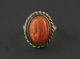 A XIX Century yellow gold and coral cameo ring
