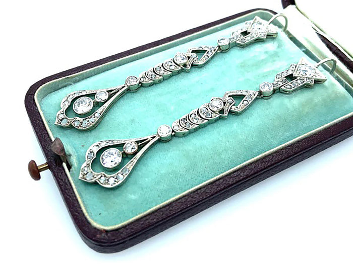 Long platinum and diamond  earrings between Edwardian and Art Deco