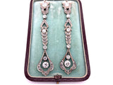 Long platinum and diamond pendant earrings between Edwardian and Art Deco