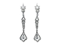 Long platinum and diamond  earrings between Edwardian and Art Deco