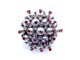 Anello cocktail in platino, diamanti, perle e rubini. 1960 circa