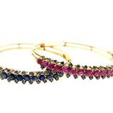 Couple of Victorian ruby, sapphire and diamond bangle bracelets