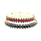 Coppia di antichi bracciali rigidi in oro giallo con rubini, zaffiri naturali e rose di diamante, XIX Secolo 