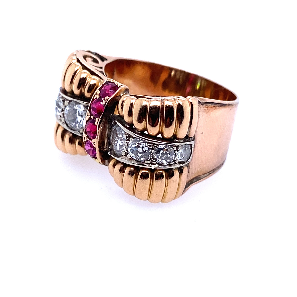 A yellow gold, diamond and ruby ring.