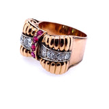 A yellow gold, diamond and ruby ring.