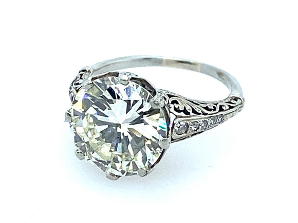 Art Deco platinum ring centering a 5 carats diamond. 1930