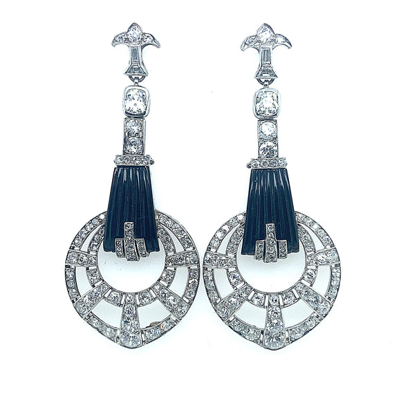 A pair of Art Déco platinum, diamond and Onyx Earrings. 1925 c.a.