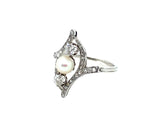 An Art Déco platinum, old cut diamond and natural perl ring