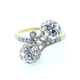 A Belle Époque gold and diamond toi et moi ring.