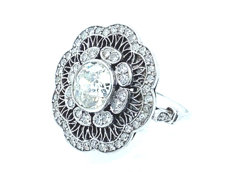 Edwardian platinum and diamond marguerite ring, 1910
