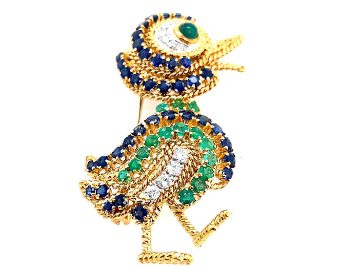 Van Cleef et Arpels gold diamond emerald and sapphire duck brooch.