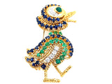 Van Cleef et Arpels gold diamond emerald and sapphire duck brooch.