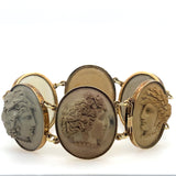 A 14 carats yellow gold bracelet with 6 lava cameos. Naples, XIX Century.