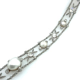 Garland Style Edwardian platinum diamond and natural pearl bracelet, 1910.