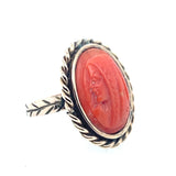 A XIX Century yellow gold and coral cameo ring