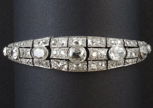 An Art Déco platinum, brilliant-cut and cushion-cut diamond bracelet. France, 1930.