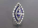A XIX Century silver topped, Yellow gold, rose-cut diamond marquise ring with blue enamel decors.