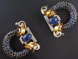 A very rare double clip brooch in Yellow gold and platinum with old-cut diamonds and sapphires. Marchak, 1940 c.a.