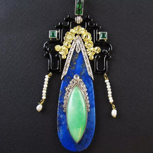 A rare Art Déco gold, platinum, jade and lapis pendant. 