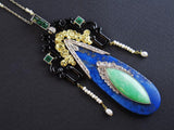 A rare Art Déco gold, platinum, jade and lapis pendant. 