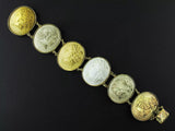A 14 carats Yellow gold bracelet with 6 lava cameos. Naples, XIX Century. 
